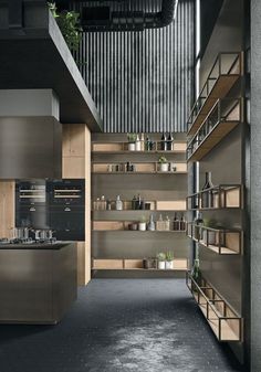 an industrial kitchen with stainless steel appliances and shelving