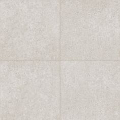 a white tile floor with four squares in the middle