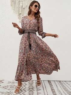 F00257608-102 Casual Flowy Midi Dress For Beach Cover-up, Flowy Casual Midi Dress For Beach Cover-up, Casual Boho Print Sundress As Beach Cover-up, V-neck Midi Dress With Paisley Print For Beach, Casual Boho Print Beach Dress, Casual Boho Print Sundress For Beach Season, Casual Boho Print Midi Dress For Beach, Casual Blue Maxi Dress With Boho Print, Casual Boho Dress With Print For Garden Party