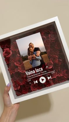 a person holding up a photo frame with roses on it and the words vanilla loca