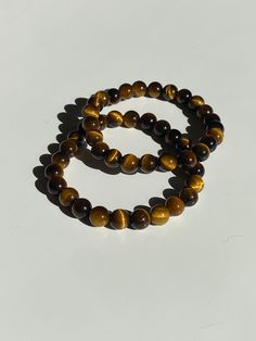 Tiger Stone Bracelet, Crystal Bracelets For Men, Spiritual Brown Hypoallergenic Jewelry, Brown Hypoallergenic Spiritual Jewelry, Hypoallergenic Brown Spiritual Jewelry, Brown Gemstone Healing Bracelets, Brown Gemstone Bracelets For Healing, Tiger Bracelet, Tiger's Eye Crystal