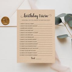 a birthday trivia card sitting on top of a table