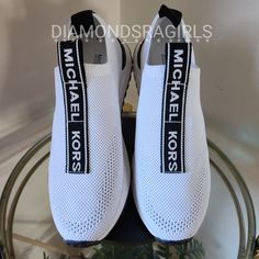 Authentic Michael Kors Bodie Slip-On Sneakers Style# 43t1bdfp5d Retail:$145 Condition: New In/With Original Box Color(S): White, Black Description: These Mk Sneakers Are A Great Interpretation Of The Sock Sneaker. Featuring A White Textile Upper, A Cushioned Foam Insole, Designer Branding And A Sleek, Sporty Outsole For An On-Trend Black And White Look. Crafted From Mesh For Breathability, With A Logo Tape Pull Tab Along The Vamp That Lends A Novelty Twist. The Lightweight, Modern Design Assures Michael Kors White High-top Sneakers, Michael Kors White Slip-on Sneakers, Michael Kors Wedge Sneakers, Mk Sneakers, White Textile, Designer Branding, Michael Kors Sneakers, Michael Kors Wedges, White Look