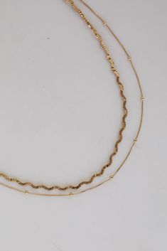 Gold Layered Chain Necklace Trendy Gold Snake Chain Layered Necklace, Dainty Gold Multi-strand Layered Necklace, Gold-plated Double Chain Layered Necklace, Chic Gold-plated Double Chain Layered Necklace, Gold Double Chain Layered Necklace, Chic Gold-plated Layered Necklace With Double Chain, Chic Gold Plated Double Chain Layered Necklace, Layered Double Strand Chain Necklace, Gold Chain Double Strand Layered Necklace