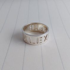 All of our products are handmade.This Personalized monogram ring is one of the most special and personal pieces of jewelry you can own or give as a gift.This Personalized ring is made of solid sterling silver,engraved with monogram, roman numerals, Spray Paint Font or any initials or names you request.Please let me know upon checkout in 'notes to seller':Your purchase will arrive inside a lovely gift box ready for gift giving.All items will be shipped within 3-5Business days after payment receiv Initial Ring Gold, Date Ring, Silver Initial Ring, Paint Font, Gold Initial Ring, Japanese Jewelry, Name Ring, Letter Ring, Monogram Ring