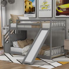 there is a bunk bed with a slide on the bottom