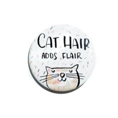 a button that says cat hair adds flair