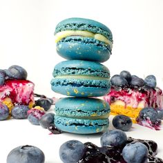 blueberry macaroons stacked on top of each other