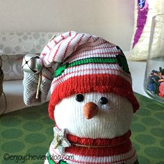 a snowman is sitting on a table