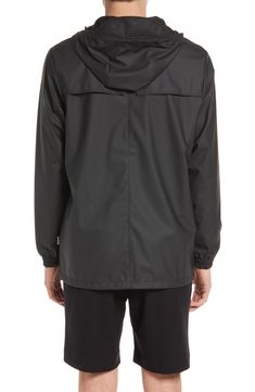 This lightweight, waterproof jacket with a longline silhouette keeps minimalism at the forefront as it keeps you dry. A hood with a built-in cap, adjustable hemline and underarm eyelets bring comfort and breathability to the design that closes with a two-way, waterproof zipper. 30" length (size Medium) Hidden front-zip closure Drawstring hood Long sleeves with elastic cuffs 100% polyester Machine wash, dry flat Imported Casual Black Outerwear With Storm Flap, Nylon Windbreaker With Storm Flap And Long Sleeves, Long Sleeve Nylon Windbreaker With Storm Flap, Black Raincoat With Storm Flap For Rainy Weather, Hooded Black Outerwear With Storm Flap, Sporty Waterproof Hooded Raincoat, Sporty Waterproof Parka For Rainy Weather, Casual Black Raincoat, Black Hooded Windbreaker In Recycled Polyester