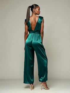 This soft satin jumpsuit features a flattering v-neck design, making it the perfect choice for mothers of the bride. Its dress pantsuit style provides comfort and elegance, while its high-quality material ensures a polished look. Stay stylish and comfortable on that special day with our jumpsuit. Dress Pantsuit, Formal Wedding Attire, Dress Pant Suit, Satin Jumpsuit, Mother Of The Bride Dress, Formal Wedding, Wedding Attire, Mother Of The Bride Dresses, Different Fabrics