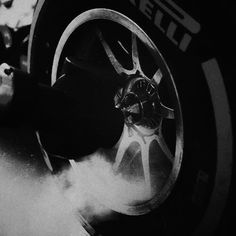 the wheel of a car with steam coming out of it