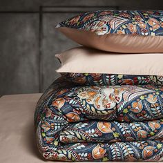 three pillows stacked on top of each other