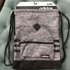 Adidas Grey And Black Back Sack Cinch Ties Nwt Adidas Casual Sports Gym Bag, Adidas Casual Travel Gym Bag, Functional Black Adidas Gym Bag, Casual Adidas Gym Bag For Travel, Casual Black Adidas Gym Bag, Adidas Black Gym Bag, Sporty Drawstring Bag For Everyday Use, Small Backpack Black, Black Fanny Pack