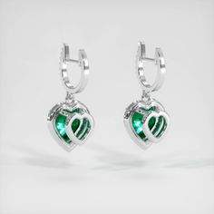 Heart shaped 2.55 total carat weight emerald earrings set in platinum 950.
#pretty ear
#pretty earrings
#jewelry earrings
#jewelry earrings studs
#cute earrings studs Green Cubic Zirconia Heart Cut Jewelry, Elegant Green Heart Cut Earrings, Elegant Green Heart Earrings For Gift, Green Heart-shaped Earrings For Anniversary, Formal Green Heart-shaped Earrings, Green Heart Earrings For Valentine's Day Anniversary, Green Heart Earrings For Anniversary On Valentine's Day, Green Double Heart Jewelry For Valentine's Day, Green Heart-cut Jewelry With Prong Setting