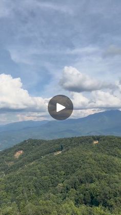 an aerial view of the mountains and trees