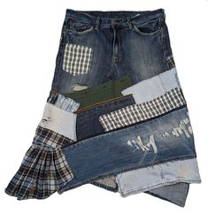 a skirt made out of old jeans with patches and plaid print on the bottom, as if it were part of a piece of clothing