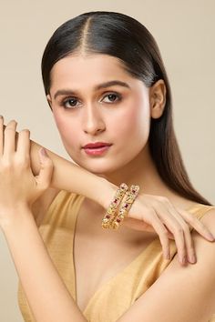 Gold polish jadau bangles studded with square stones and carved elephant motifs. - Aza Fashions Jewellery Bangles Gold, Jadau Bangles, Carved Elephant, Jewellery Bangles, Elephant Carving, Bangles Gold, Square Stone, Buy Gold, Bangle Set