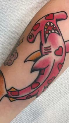 a person with a tattoo on their arm