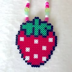 the beaded necklace is shaped like a strawberry