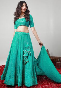 Readymade Embroidered Faux Georgette Lehenga in Turquoise This attire with Cotton Lining is Enhanced with Resham, Zari and Sequins Work. Crafted in Round Neck and Half Sleeve Available with a Faux Georgette Choli and a Faux Georgette Dupatta in Turquoise The Choli and Lehenga Length are 12 to 15 and 42 inches respectively Do note: Accessories shown in the image are for presentation purposes only.(Slight variation in actual color vs. image is possible). We sell all kinds of Lehenga and Chaniya Ch Turquoise Choli With Zari Work In Traditional Drape, Festive Turquoise Choli With Zari Work, Traditional Turquoise Dress For Festive Occasions, Anarkali Sets In Turquoise For Navratri, Traditional Turquoise Choli With Zari Work, Turquoise Dupatta For Reception In Traditional Drape, Traditional Turquoise Choli With Resham Embroidery, Festive Turquoise Traditional Wear With Unstitched Blouse, Turquoise Bollywood Choli For Receptions