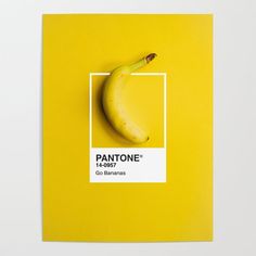 a banana sitting on top of a yellow post - it note with the name pantone