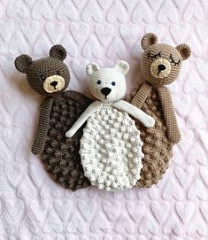 three crocheted teddy bears laying next to each other on a white blanket with the words crochet pattern below it