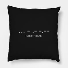 a black pillow with the words intersteular printed on it