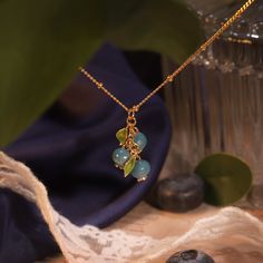 Add a burst of vibrant charm to your jewelry collection with the Blueberry Necklace, a delightful accessory that captures the essence of nature's bounty. This enchanting piece features a meticulously crafted blueberry pendant, adorned with rich enamel detailing that brings the fruit to life in stunning color. Made from durable brass and lavishly coated in 18K gold, the berry necklace combines luxurious style with lasting quality. Perfect for both everyday wear and special occasions, the blueberr Blue Flower Charm Jewelry As Gift For Her, Blue Birthstone Necklace As Gift For Her, Adjustable Blue Necklace For Her, Adjustable Blue Necklace As A Gift For Her, Blue Round Pendant Jewelry For May Birthstone, Blue Delicate Necklace With Delicate Chain, Blue Pendant Jewelry For May Birthstone, Delicate Blue Necklace With Delicate Chain, Delicate Blue Necklace With Adjustable Chain