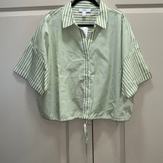 New Forever 21 Striped Shirt, Size 3x, Never Worn, Tags Still Attached, Colors Include Green & White, Button Down Shirt With String At Bottom For Option To Adjust At Waist, Has A Collar, 100% Cotton, Will Come From A Pet/Smoke Free Home Fyi, Can Be Cropped Based On Your Height Forever 21 Relaxed Fit Short Sleeve Tops, Forever 21 Green Tops For Spring, Forever 21 Short Sleeve Blouse For Day Out, Chic Green Top From Forever 21, Forever 21 Green Cotton Tops, Forever 21 Cotton Shirt For Spring, Forever 21 Collared Summer Tops, Forever 21 Shirt For Spring Day Out, Forever 21 Collared Tops For Summer