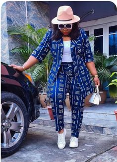 A beautiful and well tailored Ankara jacket and trouser. It is made with 100 % cotton high quality Ankara fabric, that can be worn together or as separate piece. This set is very versatile as it can be dressed up or down, to give you a well polished and unique look. Ankara Jackets For Women, African Pants Suit, Ankara Suit, Ankara Trousers, African Print Pants, Kitenge Designs, Ankara Jackets, Pant Suits For Women, African Outfits