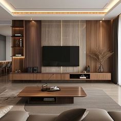 a living room with couches and a tv on the wall in front of it