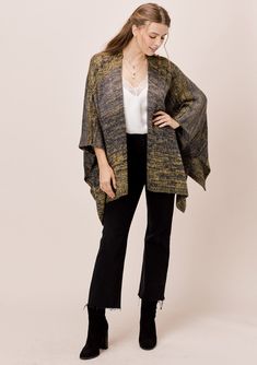 This soft, oversize poncho cardigan in a beautiful space-dye is the perfect sweater to transition to cooler weather. Featuring an oversize, easy silhouette, an open front, and cool open-knit details. A cozy bohemian style that pairs effortlessly with jeans. FINAL SALE Space dyed Oversized, relaxed fit Hip length Side vents Open front Distressed details Model is 5'8, wearing a size S.Style: I-50830K-QRJ Versatile Oversized Knit Outerwear, Casual One-size Poncho For Layering, One Size Soft Knit Poncho For Fall, Trendy Oversized Poncho For Fall, Casual One Size Fall Poncho, Oversized Spring Poncho For Loungewear, Trendy Oversized Batwing Sleeve Poncho, Trendy Oversized Poncho With Batwing Sleeves, Casual Soft Knit Fall Poncho