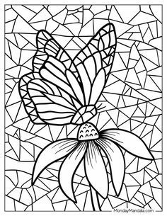 a butterfly sitting on top of a flower in a stained glass window with black and white lines