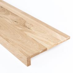 a close up of a wooden board on a white background