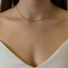 Elegant Gold-plated Beaded Necklaces, Elegant Yellow Gold Necklaces With Gold Beads, Dainty Gold Bead Choker Necklace, Dainty Gold Beaded Choker Jewelry, Delicate Gold Beaded Choker Necklaces, Dainty Yellow Gold Beaded Chain Necklace, Elegant Gold Chain Necklace With Beads, Gold Fine Jewelry Chain Necklace For Wedding, Gold Beaded Clavicle Chain Choker