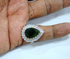 Vintage antique classic 18 K solid gold natural pear shape Emerald and VS G Diamond Ring. Fully handmade collection piece in very good condition. USA ring size-7.5 ( we can adjust size), size of top-19/25 mm, weight-10 grams, material- 18 K gold, natural Emerald, and Diamond. Teardrop Brilliant Cut Emerald Wedding Ring, Wedding Teardrop Emerald Ring With Brilliant Cut, Gia Certified Teardrop Diamond Ring For Formal Occasions, Formal Gia Certified Teardrop Diamond Ring, Teardrop Emerald Ring For Formal Occasions, Teardrop Emerald Ring With Brilliant Cut, Pear-shaped Emerald Ring For Anniversary, Gia Certified Teardrop Wedding Rings, Pear-shaped Emerald Anniversary Ring