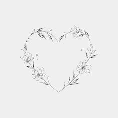 the outline of a heart with flowers on it