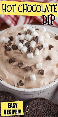 an ice cream dessert with marshmallows and chocolate chips in a white bowl