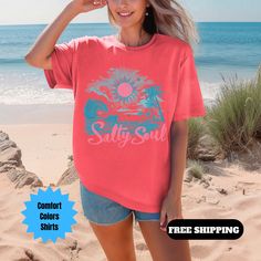 Salty Soul Shirt, Trendy Summer Shirt, Beach Vibes Shirt, Beach T Shirt, Summer Salty Soul, Ocean Shirt, Vacation Shirt, Comfort Colors -How to order: -Select shirt size -Select shirt color -IMPORTANT Please select design color in the Personalization box. -Add to the cart and check out. Order is ready to ship i 1-3 business days. USPS First Class Mail (2-6 days) Need your order sooner. Upgrade to USPS Priority Mail (1-4 days) in cart for additional charge Comfort Colors Shirt Features 6.1 oz., 1 Relaxed Fit Pink Shirt For The Beach, Relaxed Fit Pink Shirt For Beach, Pink Relaxed Fit Shirt For Beach Season, Pink Cotton Shirt For The Beach, Pink Cotton Shirt For Beach Season, Pink Cotton Tops For Vacation, Pink Relaxed Fit Shirt For The Beach, Pink Letter Print Shirt For Vacation, Pink Crew Neck Top For Beach Season