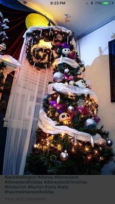 a christmas tree decorated with ornaments and lights