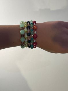 My name is Ilinca, I am 11 years old and I am from Romania. All of the bracelets are made by me. At first I only made them for friends and family, But recently I decided to thy and sell them, as all of my friends and family said they really like them, and they wear them all the time. With the help on my cousin I succed to set up my Etsy store, and now I am ready to sell them to you! Hope you like them! Bracelets To Sell Diy, Friendship Hand Wrapped Bangle Bracelet, Green Handmade Wrap Bracelet For Friendship, Handmade Green Wrap Bracelet For Friendship, Handmade Spiritual Bracelet For Friendship, Unique Hand Wrapped Beaded Friendship Bracelets, Handmade Crystal Bangle Bracelet For Friendship, Green Hand-wrapped Friendship Bracelet, Spiritual Hand Wrapped Green Friendship Bracelets