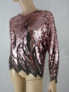 "Women's Beaded Top 80s 100% Silk Beaded Sequined Pink Excellent LIKE NEW Condition Vintage Size M by OLEG CASSINI This gorgeous lux 100% silk top has black beading and light pink sequins...lots of movement. Pink sequined beaded, 3/4 sleeve, slightly stretchy pullover with hook ans eye at back neck, abstract design cut-out at cuff and hymn line, fabulous silhouette. Super high quality. STUNNING! In excellent LIKE NEW condition... THIS IS AN EXCEPTIONAL PIECE Easy to wear casual chic vintage for Vintage Sequin Top, Pink Sequin Top, Formal Tops, Oleg Cassini, Beaded Top, Pink Sequin, Chic Vintage, Sequin Top, Silk Top