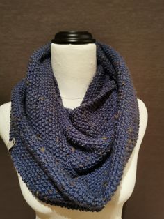 The Montana Denim is a gorgeously soft Wool knit infinity scarf. Measuring 27cm across, 74cm length with plenty of stretch.  Knitted 90% wool, 7% acrylic, 3% viscose.  Machine washable, cold water, gentle cycle.  Do not tumble dry. Beautiful as single or double layer.  Colour is a gorgeous denim blue with flecks of dark brown, cream & rust.   The Montana Denim is a unique but versatile one of a kind accessory for any outfit. Crochet Infinity Scarf, Knit Infinity Scarf, Wool Knit, Soft Wool, Lovely Colors, Denim Blue, Infinity Scarf, Soft Knits, Double Layer