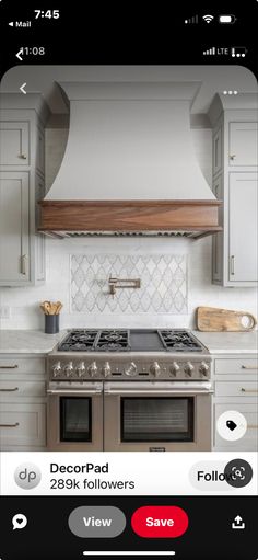 a kitchen with an appliance on the phone showing what's in the oven