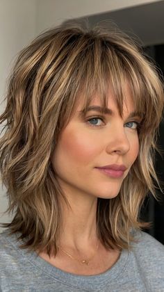 Medium-Length Shag Haircuts Medium Length Shag For Fine Hair, Wash And Go Shag Haircut, Dark Blonde Shag, Modern Day Shag Haircut, Medium Length Shag With Bangs, Medium Length Shag Haircuts With Bangs, Medium Shag Haircuts For Fine Hair, Shoulder Length Choppy Hair, Shag For Fine Hair