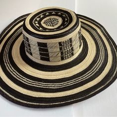 Original Sombrero Vueltiao Hat, Imported From Colombia Made By Zenu People Original Piece Tradicional Design Can Be Fold And Restores The Original Shape Black Brimmed Panama Hat For Rodeo, Black Wide Brim Straw Hat For Rodeo, Black Brimmed Woven Panama Hat, Black Woven Panama Hat With Flat Brim, Black Woven Panama Hat With Short Brim, Black Woven Brimmed Panama Hat, Black Brimmed Toquilla Straw Hat, Black Woven Flat Brim Panama Hat, Black Woven Fedora Hat