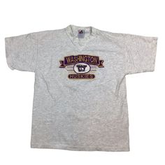 Vintage Washington Huskies Tshirt. Made in the USA. 90s. High-quality. Stitched graphic. Tagged as a large, measures more as a medium. 21 inches pit to pit, 27 inches long. Excellent vintage condition. Smoke and pet free home. University of Washington. Seattle. Huskies. Vintage 90s T-shirt. UDUB. Vintage Embroidered Tops For College, Vintage Embroidered Graphic Top For College, 90s Style Short Sleeve College T-shirt, 90s Style College T-shirt With Screen Print, 90s Style Crew Neck T-shirt For College, Throwback Graphic Print T-shirt For College, Throwback Graphic T-shirt For College, Vintage Embroidered College Top, 90s Cotton Tops With Embroidered Graphics