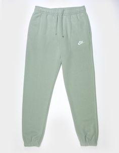 Nike Sportswear Club Fleece Sweatpants. Combines Classic Style With The Soft Comfort Of Fleece. Standard Fit Has A Relaxed, Easy Feel. Tapered Leg. Elastic Waistband. Side Pockets. Embroidered Logo On Left Leg. Elastic Cuffs. Fleece Lining. 80% Cotton 20% Polyester. Machine Wash. Imported. Nike Sweat Sets, Preppy Sweatpants, Green Nike Sweatpants, High Rise Sweatpants, Nike Mens Clothing, Trendy Sweatpants, Nike Clothes, Cute Sweats, Bday Wishlist