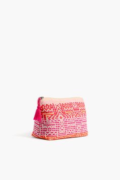 Grab our make-up bag for all your essentials. Perfect for your make-up, skincare, or just about anything, this little bag packs a big punch! Hand woven in beautiful colors, this bag may be small, but it sure is mighty! Traveling somewhere? Take this little bag along and know youâ€™ll be getting compliments from friends and strangers alike! Itâ€™s the perfect size to pop into a travel bag. We know youâ€™re going to love this little bag and each time you grab it from your tote or purse, a smile wi Rectangular Cosmetic Bag With Zipper For Vacation, Pink Woven Pouch Bag, Multicolor Pouch Cosmetic Bag, Pink Pouch Cosmetic Bag As Gift, Bohemian Cosmetic Bag With Zipper For Everyday Use, Handmade Pink Cosmetic Bag For Travel, Bohemian Style Zipper Cosmetic Bag, Pink Beach Bag With Zipper Pouch, Pink Vacation Bag With Zipper Pouch